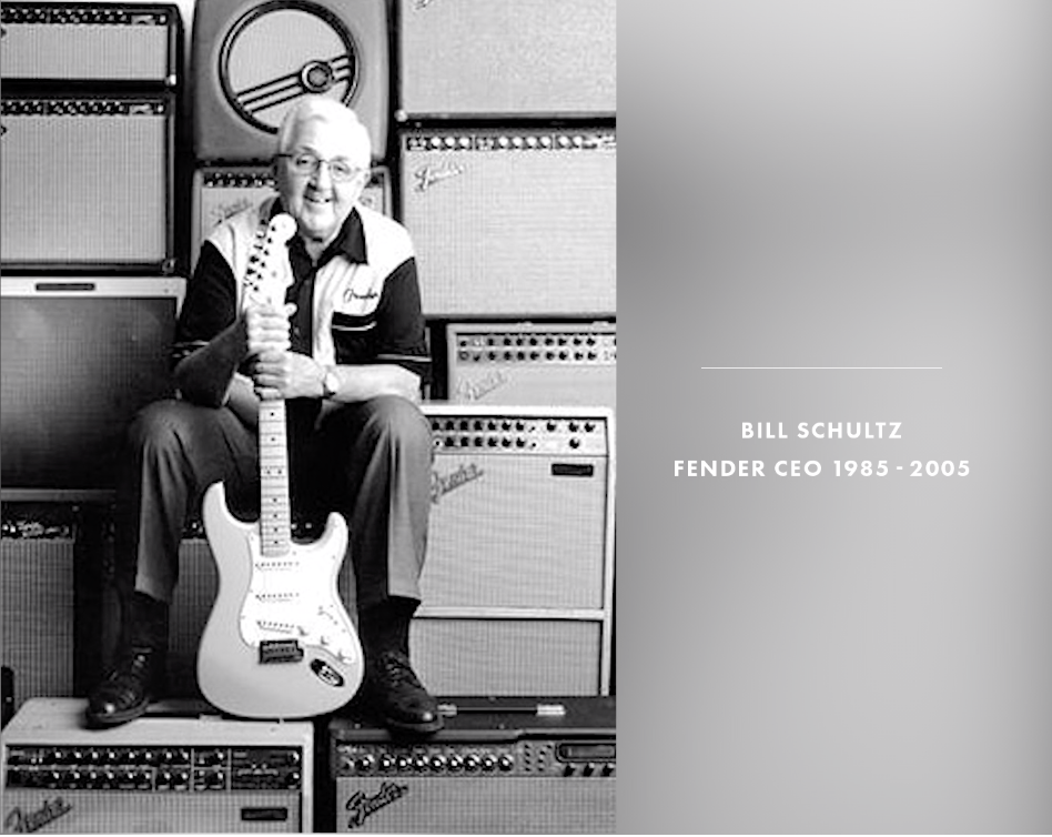 Black and white photo of a person holding a guitar in front of Fender amplifiers with text about Bill Schultz, Fender CEO.